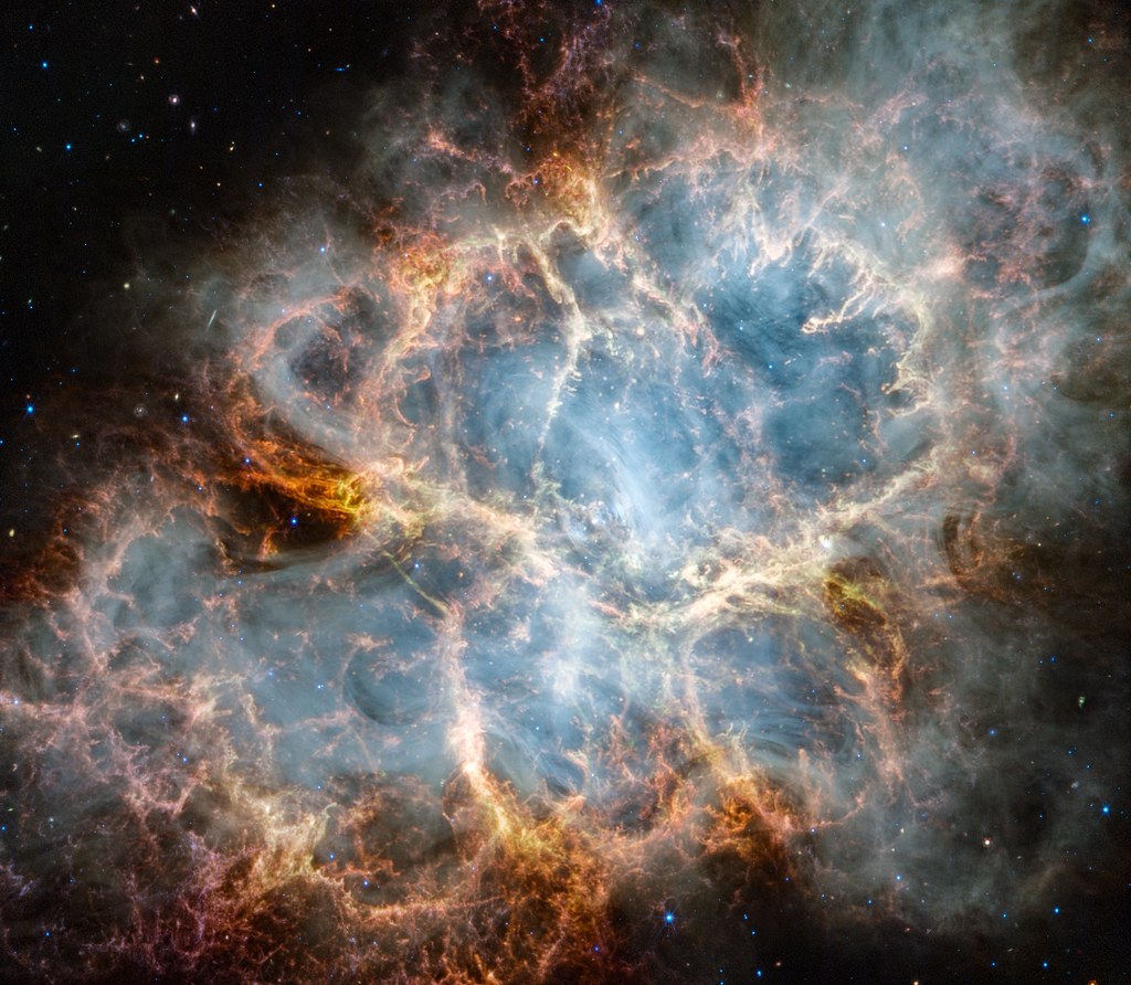 The Crab Nebula Seen in New Light by NASA's Webb (NIRCam and MIRI) image